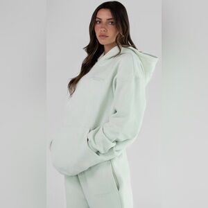 Comfrt pastel hoodie in mint, limited edition brand new in bag.